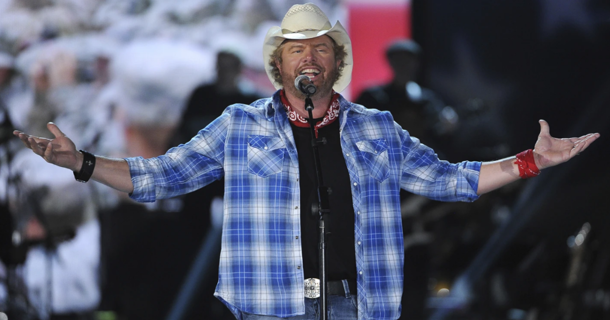  In this April 7, 2014, file photo shows Toby Keith performs at ACM Presents an All-Star Salute to the Troops in Las Vegas. “Beer For My Horses” singer-songwriter Toby Keith has died. He was 62. Keith passed peacefully on Monday, Feb. 5, 2024 surrounded by his family, according to a statement posted on the country singer's website.(Photo by Chris Pizzello/Invision/AP, File)