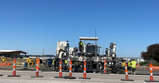 Construction workers continue concrete paving on Hwy30 between North Road and Claude Road in Grand Island. 