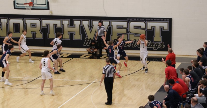 Northwest Boys Run Away From Adams Central, 64-43